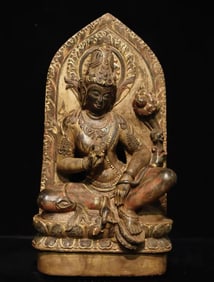 A 7th-century bluestone painted Guanyin statue