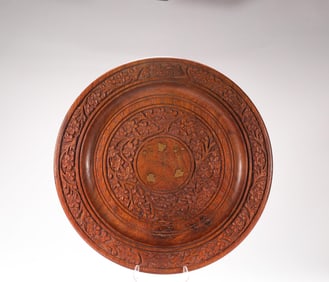 A Qing Dynasty boxwood plate