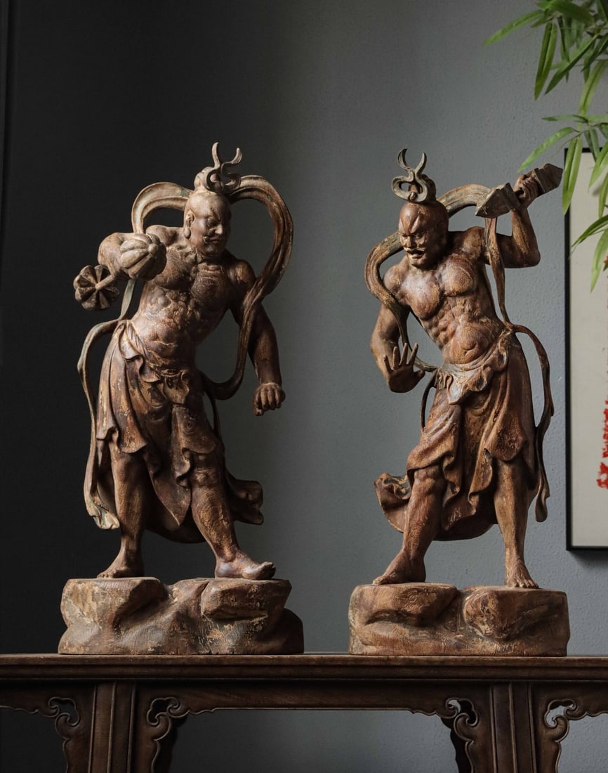 MING DYNASTY CAMPHOR WOOD VAJRA WARRIOR FIGURE: H:67.6cm(26.61in)W:30cm(11.81in)T:15cm(5.91in)The solid wood bears deep mild ancient patina after years of erosion with faded original pigment traces and profound primitive Zen charm. With perfect int