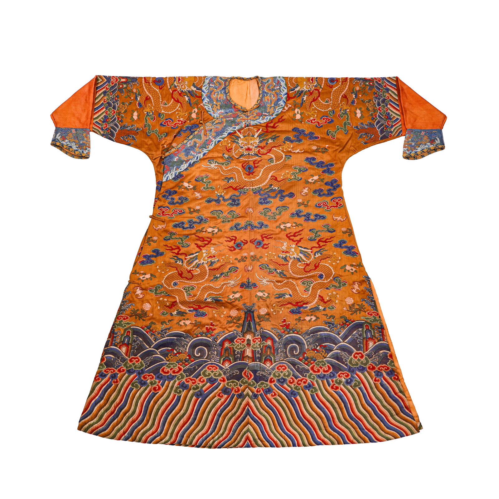 QING DYNASTY, ORANGE GROUND, BROCADE WITH GOLDEN DRAGON PATTERNS, KESI DRAGON ROBE: H:140cm(55.12in) W:193cm(75.98in) This dragon robe is a national treasure of Qing Dynasty court attire. With an orange-yellow (apricot yellow) silk base, it adopts the Kesi (silk tapestry) or weaving 