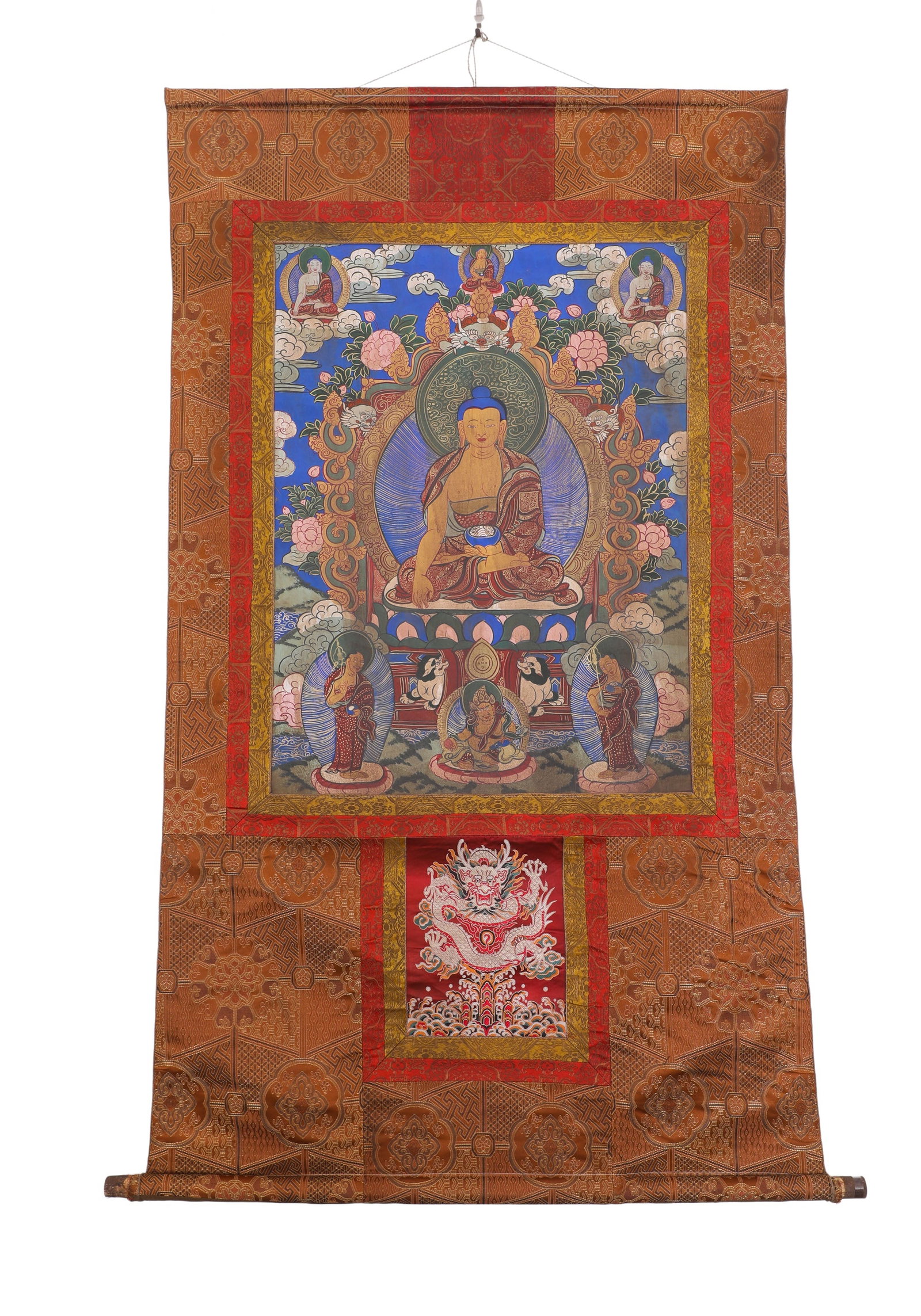 QING DYNASTY THANGKA OF SAKYAMUNI BUDDHA: H:78cm (30.71in) W:59cm (23.23in)The main deity is Sakyamuni Buddha, sitting in meditative lotus posture with alms bowl in hands and solemn kasaya. The painting is surrounded by attendant disciples, a