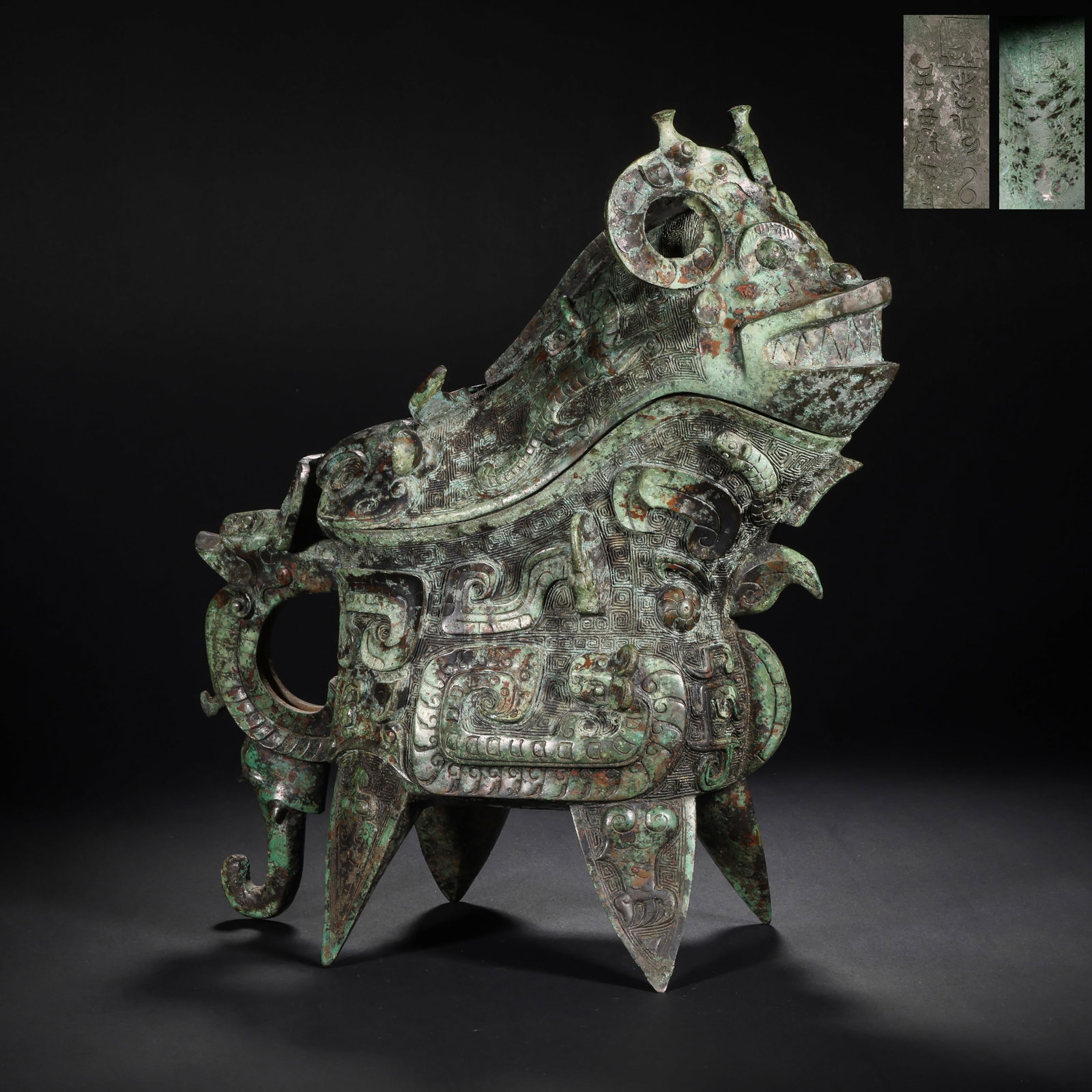 SHANG DYNASTY BRONZE BEAST SHAPE ?: H:33.0cm(12.99in) W:29.5cm(11.61in) Weight:4320g(9.52lb)This vessel is cast in bronze, shaped as a beast with head held high and mouth open, supported by four pointed feet, with a handle on the side. 