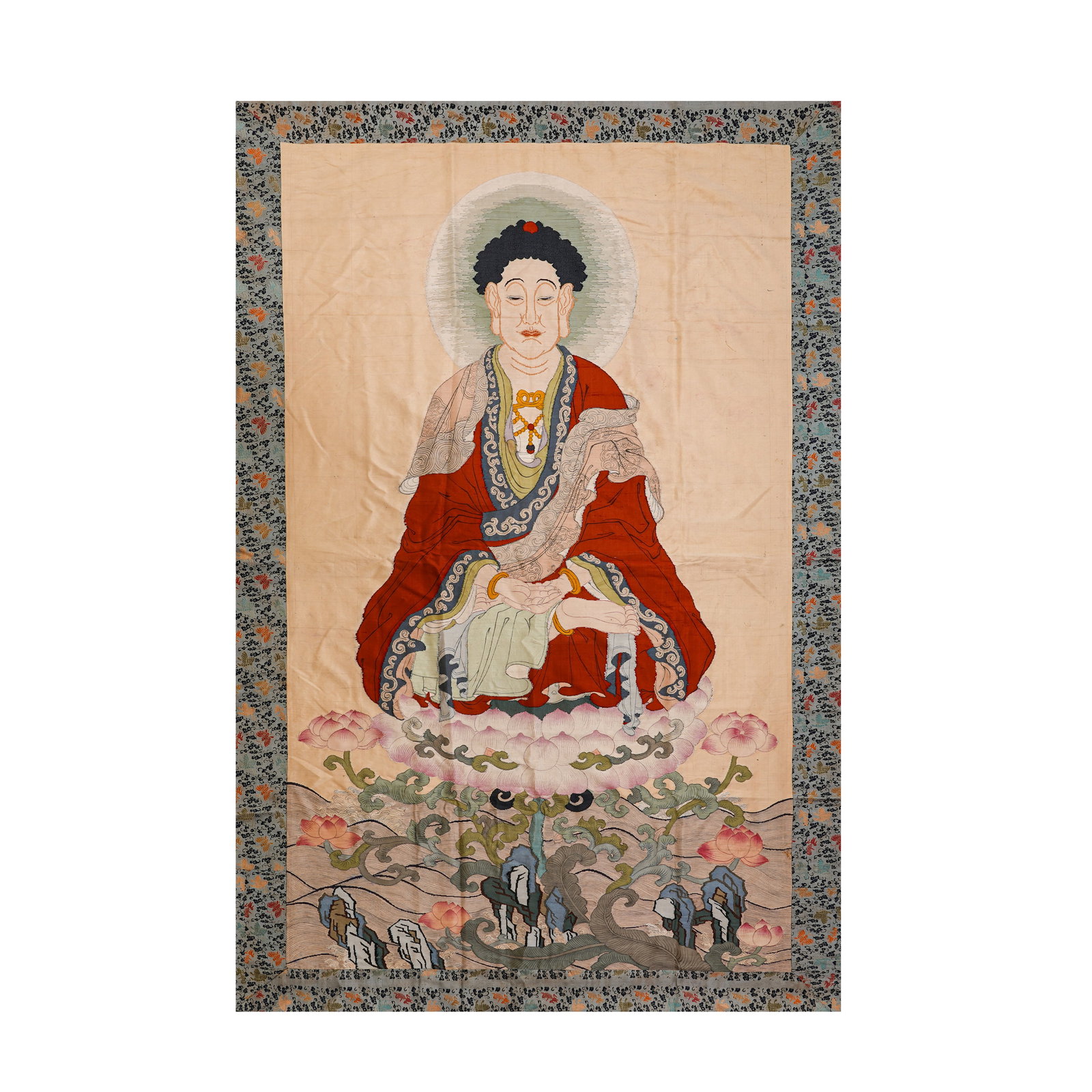 QING DYNASTY KESI SAKYAMUNI SEATED THANGKA (TAPESTRY): H:161cm(63.39in) W:95cm(37.40in)This Thangka is a national treasure of Tibetan Buddhism Kesi craftsmanship in the Qing Dynasty. Made of mulberry silk, it adopts the "passing warp and breaking weft" Ke