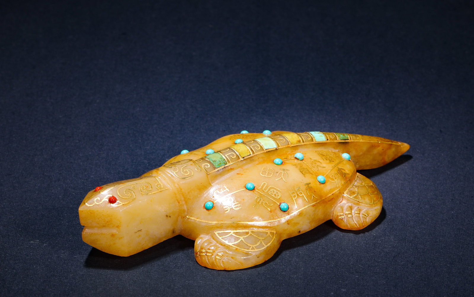 HAN DYNASTY JADE INLAID GOLD AND SILVER INLAID GEMSTONE TORTOISE ORNAMENT: H:2cm(0.79in) W:11cm(4.33in) Weight:120g(0.26lb) This is an ancient jade divine turtle ornament with gold and silver inlay and gemstone inlay, inscribed with ancient characters and featuring exquisite