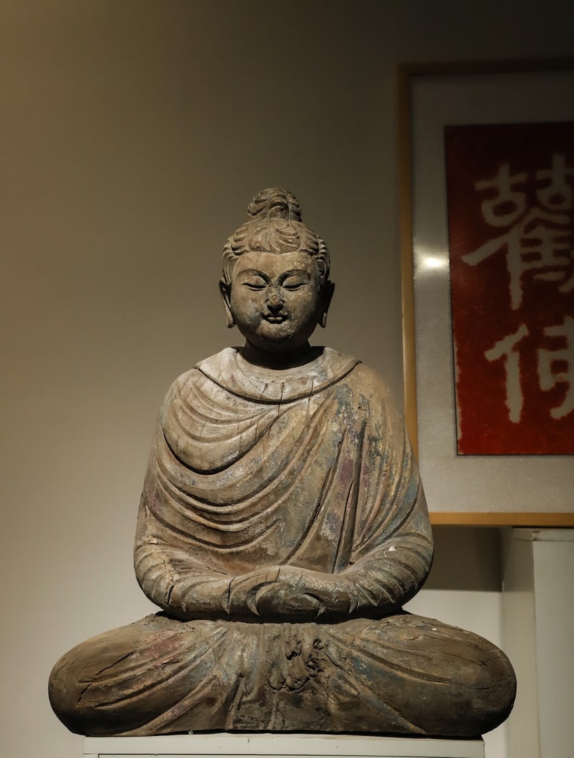 A WOODEN STATUE OF SAKYAMUNI FROM THE TANG DYNASTY (1 of 9)