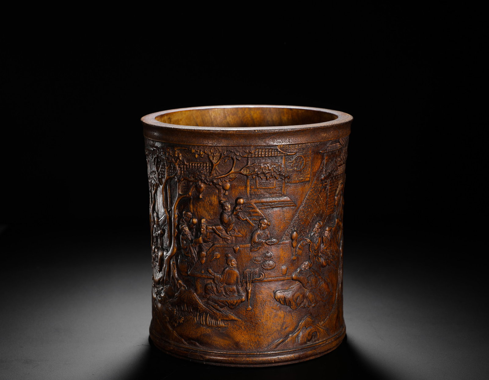 A HIGH-RELIEF SCHOLAR PEN HOLDER MADE OF AGARWOOD FROM THE QING DYNASTY (1 of 9)