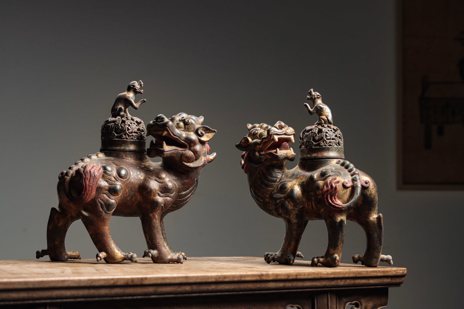 A PAIR OF COPPER INCENSE BURNERS FOR AUSPICIOUS BEASTS FROM THE MING DYNASTY: H:31cm L:26cm W:14cm