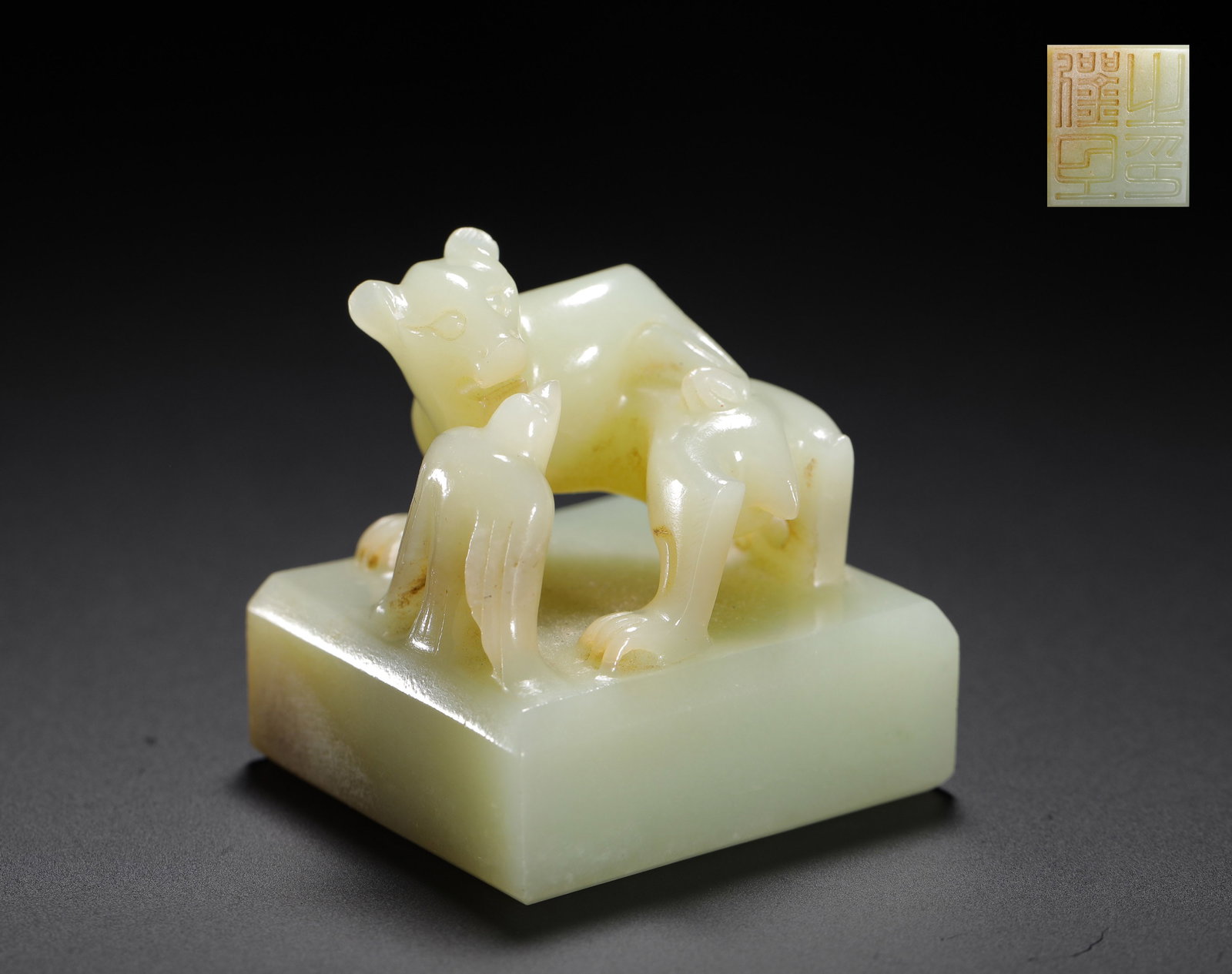 HAN DYNASTY HETIAN WHITE JADE "BEAR BIRD KNOB" SQUARE SEAL: H:4.3cm(1.69in)W:4cm(1.57in)Weight:90g(0.20lb)Jade seals were important symbols of status in the Han dynasty. "Han Wang Zhi Yin" indicates it was used by a regional king. The bear and bird motif symbo