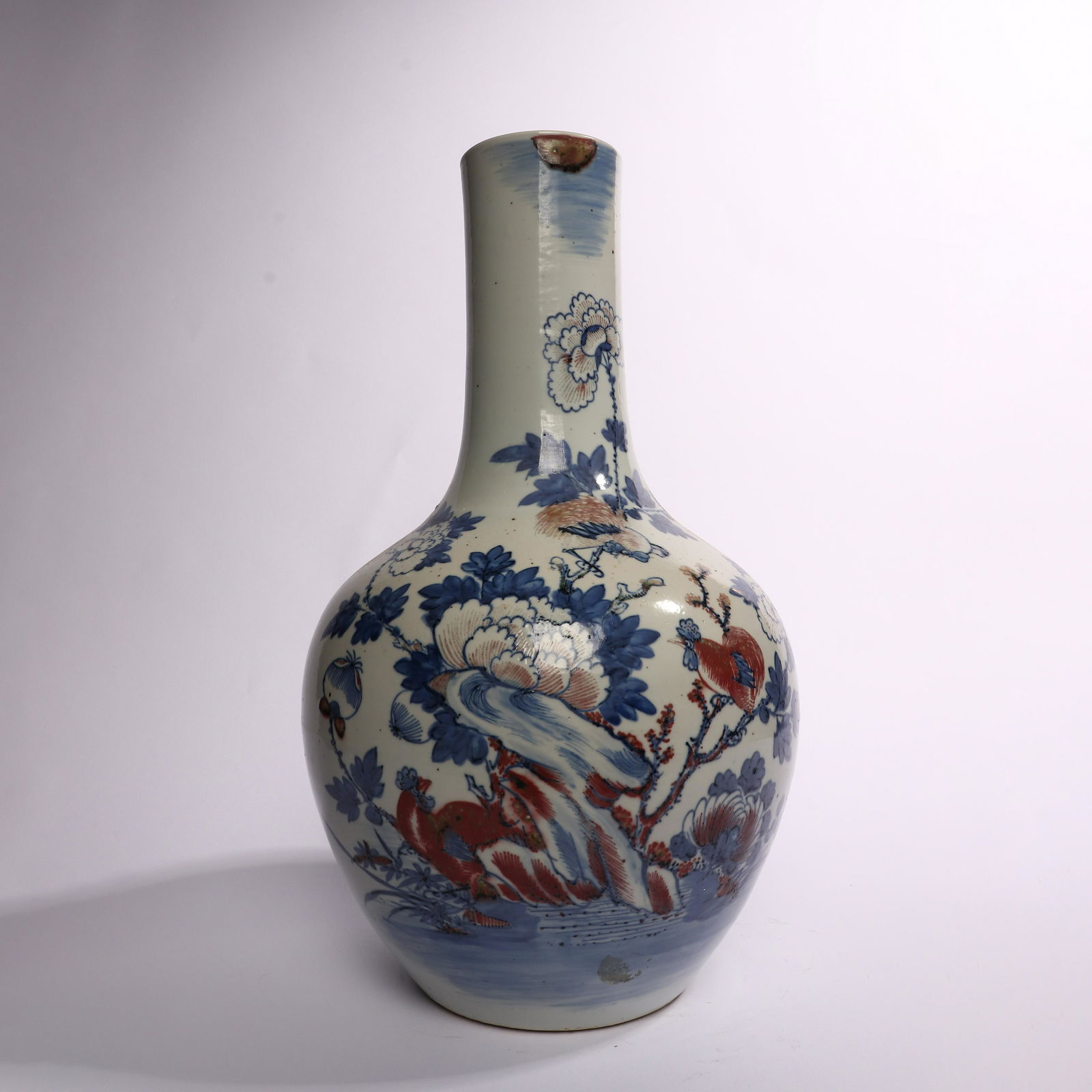 Blue and white vase decorated with red flowers in glaze (1 of 9)