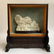 A QING DYNASTY CARVED WHITE JADE ORNAMENT WITH A