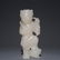 A QING DYNASTY CARVED WHITE JADE CHILD ORNAMENT