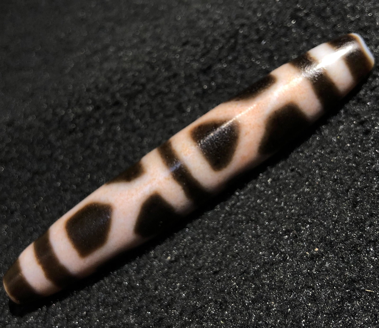 A HAN DYNASTY TIANZHU: L:7.5cm