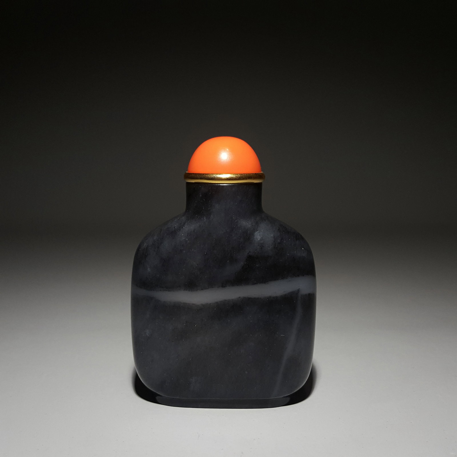 A QING DYNASTY HETIAN JADE BLUE AND WHITE SNUFF BOTTLE (1 of 9)