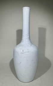 QING DYNASTY WHITE GLAZE PANLONG BOTTLE