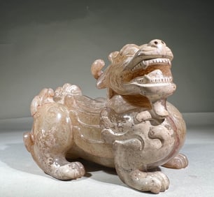 TANG DYNASTY WHITE JADE AUSPICIOUS BEAST