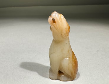 MING DYNASTY WHITE JADE LOOKS TO THE SKY AND ROARS