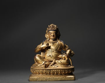 A bronze gilt statue of the God of Wealth, Ming Dynasty, China
