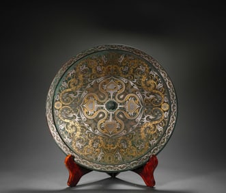 A gold and silver bronze mirror, Han Dynasty, China