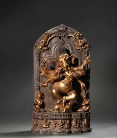 A bronze gilt elephant trunk statue of the God of Wealth, Ming Dynasty, China