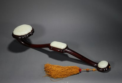 A rosewood inlaid with Hetian jade Ruyi, Qing Dynasty, China