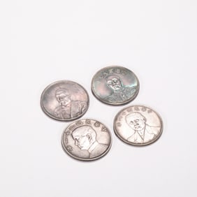 A group of Chinese silver dollars