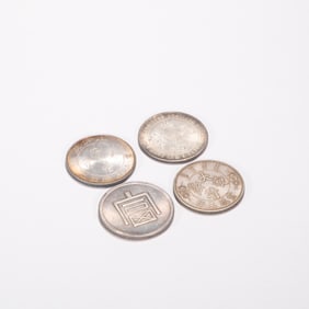 A group of Chinese silver dollars