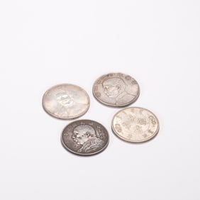 A group of Chinese silver dollars