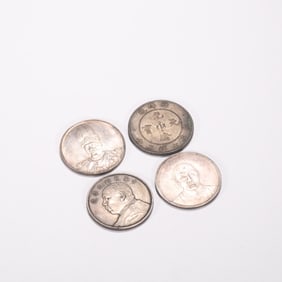 A group of Chinese silver dollars
