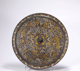 Filed gold and silver bronze mirror