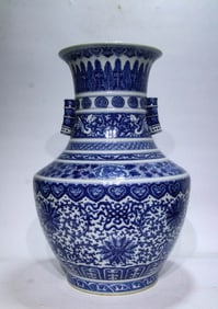 QING DYNASTY BLUE AND WHITE STATUE