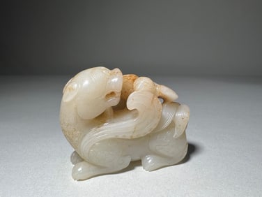 MING DYNASTY WHITE JADE AUSPICIOUS BEAST