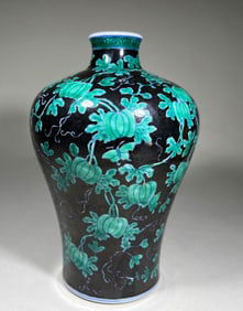 QING DYNASTY BLACK BACKGROUND GREEN GLAZED PLUM VASE