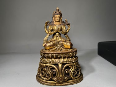 MING DYNASTY GILT FOUR-ARMED GUANYIN