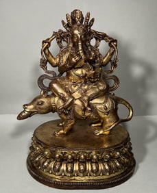 MING DYNASTY GILT BRONZE ELEPHANT TRUNK GOD OF WEALTH AND HEAVENLY KING