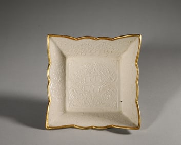 A flower carved Ding kiln porcelain plate,Song Dynasty,China
