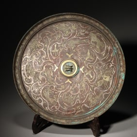 A gold and silver-inlaid bronze mirror,Zhou Dynasty,China