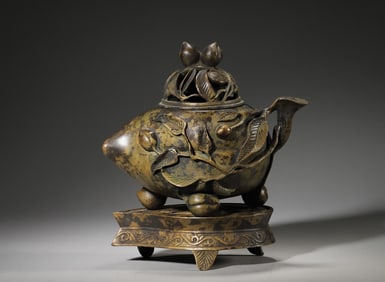 A peach shaped hollowed out copper incense burner,Ming Dynasty,China,Ming Dynasty,China