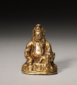 A gilding copper yellow Jambhala statuette,Qing Dynasty,China