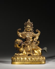 A gilding copper yellow Jambhala statue,Qing Dynasty,China