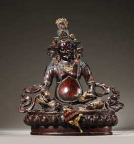 A painted aloeswood yellow Jambhala statuette,Qing Dynasty,China