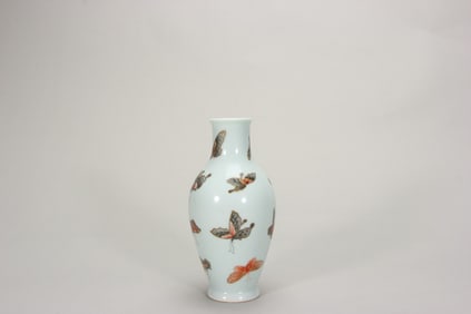 A famille rose butterfly patterned olive shaped porcelain vase,Qing Dynasty,China,Qing Dynasty,China