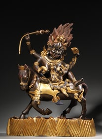 A gilding copper yellow Jambhala statue,Qing Dynasty,China