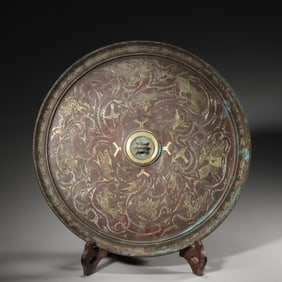 A gold and silver-inlaid bronze mirror,Zhou Dynasty,China