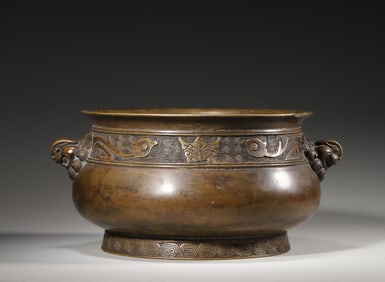 A taotie and phoenix bird patterned copper censer with pheasant shaped ears,Qing Dynasty,China