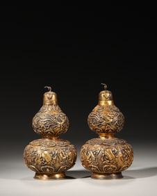 A pair of eight treasures patterned gilding silver gourd shaped vases,Qing Dynasty,China