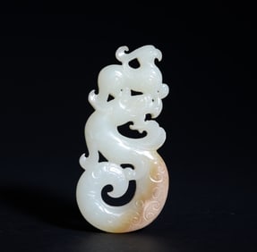 HAN DYNASTY DRAGON-SHAPED JADE PENDANT