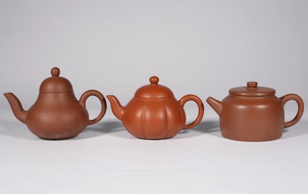 THREE CHINESE PURPLE CLAY TEAPOTS