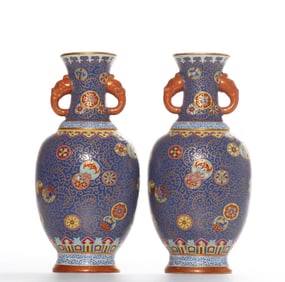 A PAIR OF QING DYNASTY PASTEL FLOWER PATTERN WALL VASES