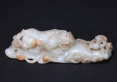 WHITE JADE ANIMAL-SHAPED PAPERWEIGHT FROM HAN DYNASTY