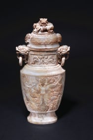 HAN DYNASTY JADE BOTTLE WITH DRAGON PATTERN